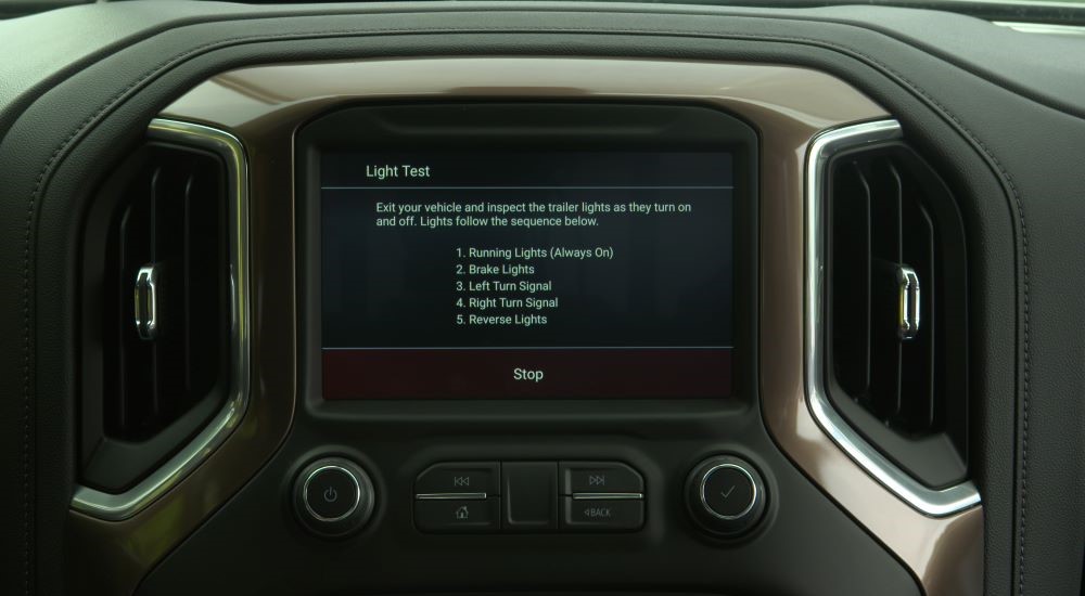 A light test is shown on the infotainment screen in a 2019 Chevy Silverado 1500.